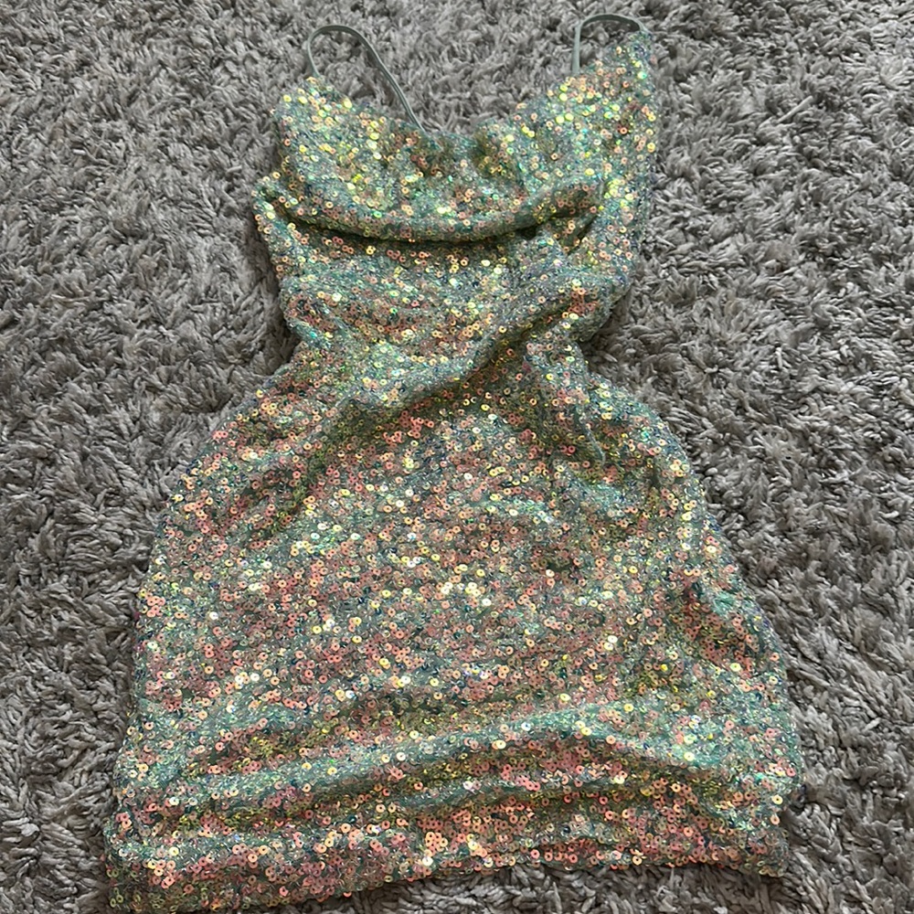 multicolored sequins (reflects teal)